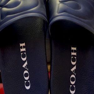 Coach slides- size 9 brand new. Black with gold lettering.
